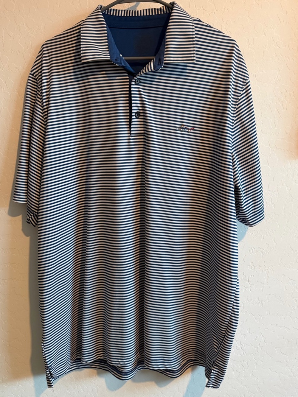 Greg Norman Men's Navy and White Striped Polo Shirt